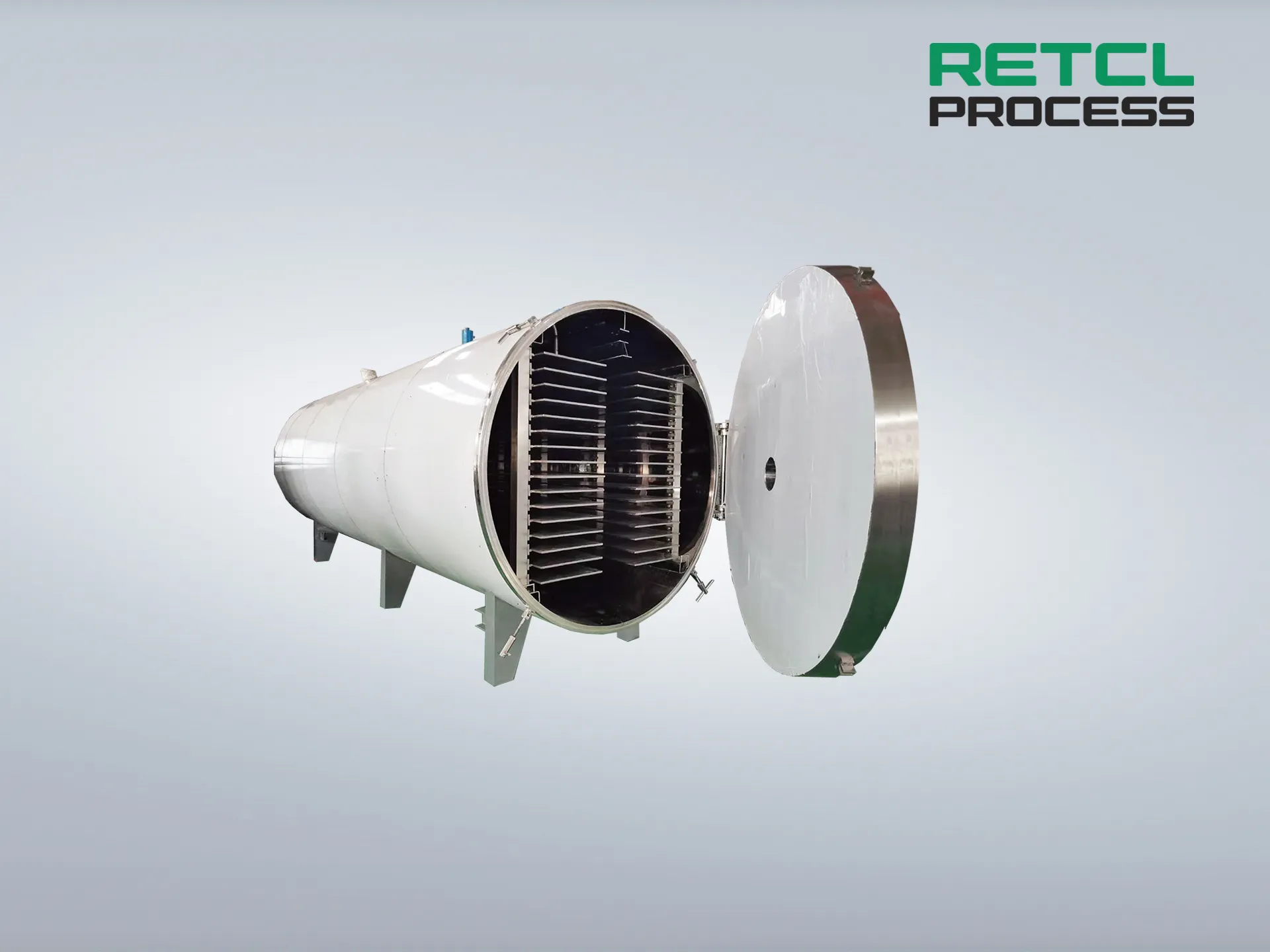 工业圆仓冷冻干燥设备用于冻干工艺,带有RETCL PROCESS公司标志。